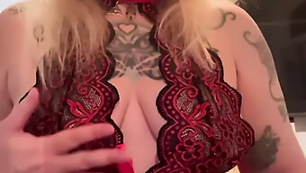 Mature Woman In Homemade Video Shows Off Piercing And Tattoos In Red Lingerie